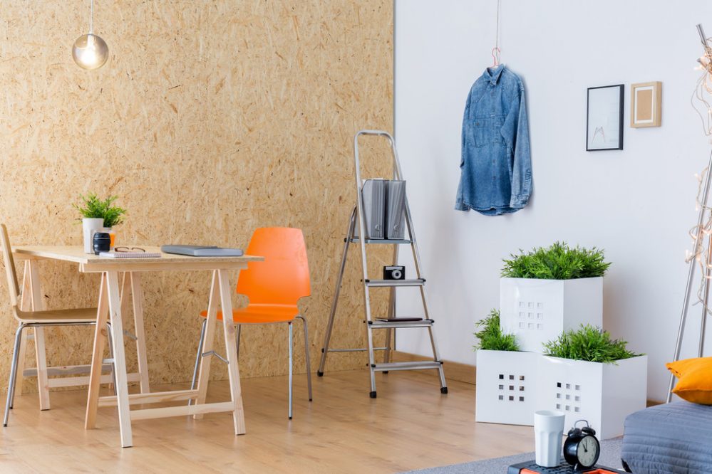 Creative studio for young designer Osb wall in creative studio for young designer